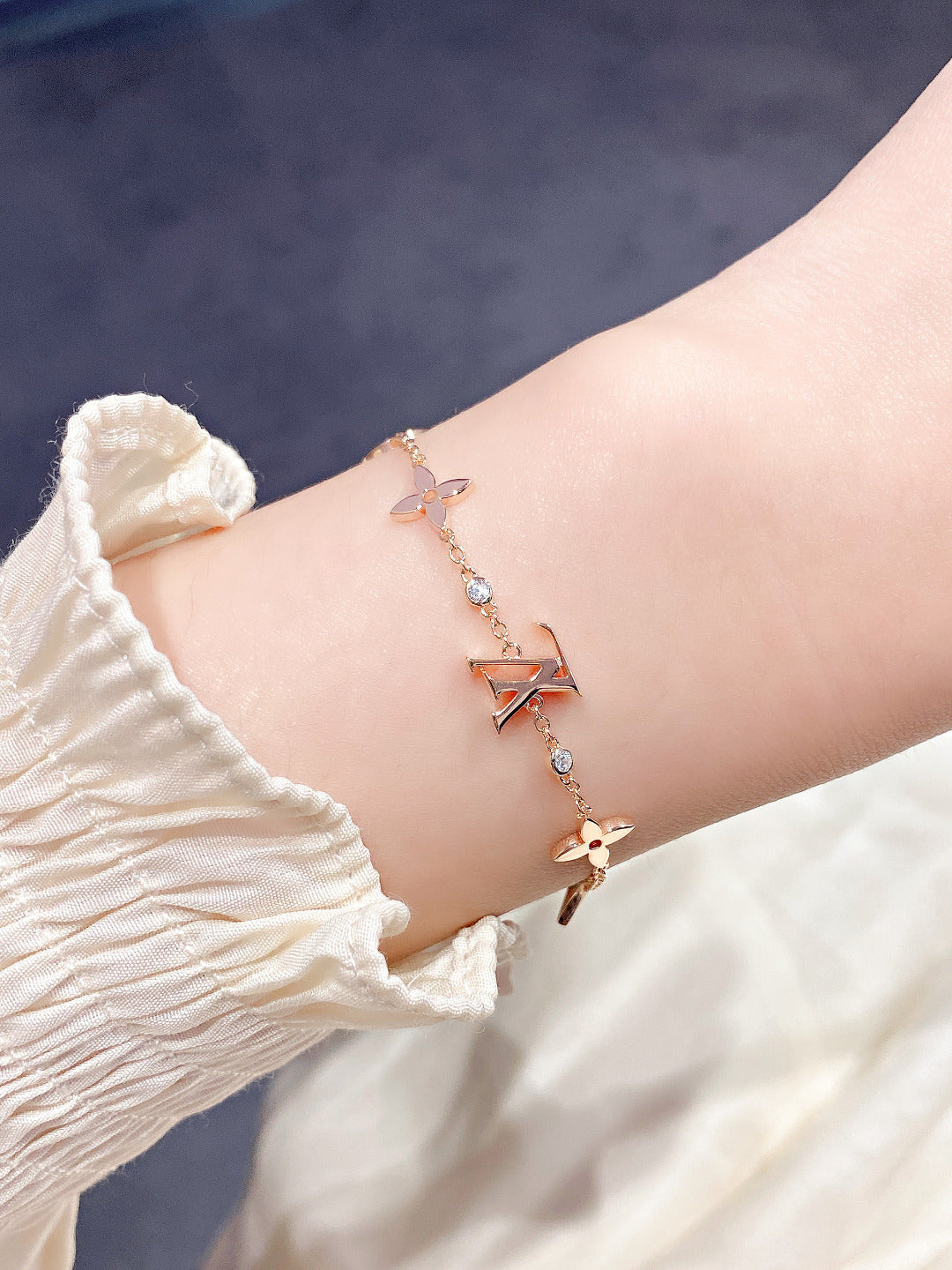 ??MIRA?¡¥STAR AND SUN 7 MOTIFS GOLD BRACELET