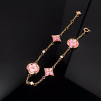 ??MIRA?¡¥STAR AND SUN 4 MOTIF PINK MOP PINK GOLD BRACELET