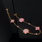 ??MIRA?¡¥STAR AND SUN 4 MOTIF PINK MOP PINK GOLD BRACELET