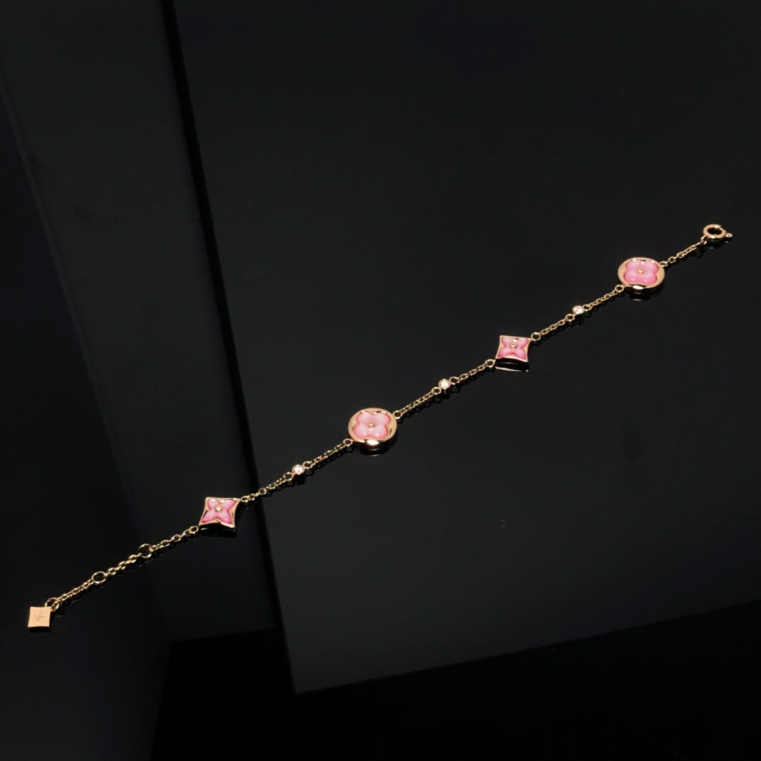 ??MIRA?¡¥STAR AND SUN 4 MOTIF PINK MOP PINK GOLD BRACELET