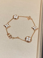 ??MIRA?¡¥STAR AND SUN 5 MOTIF MOP PINK GOLD BRACELET
