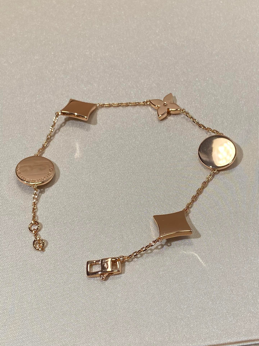 ??MIRA?¡¥STAR AND SUN 5 MOTIF MOP PINK GOLD BRACELET
