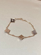??MIRA?¡¥STAR 4 MOTIF MOP DIAMOND PINK GOLD BRACELET