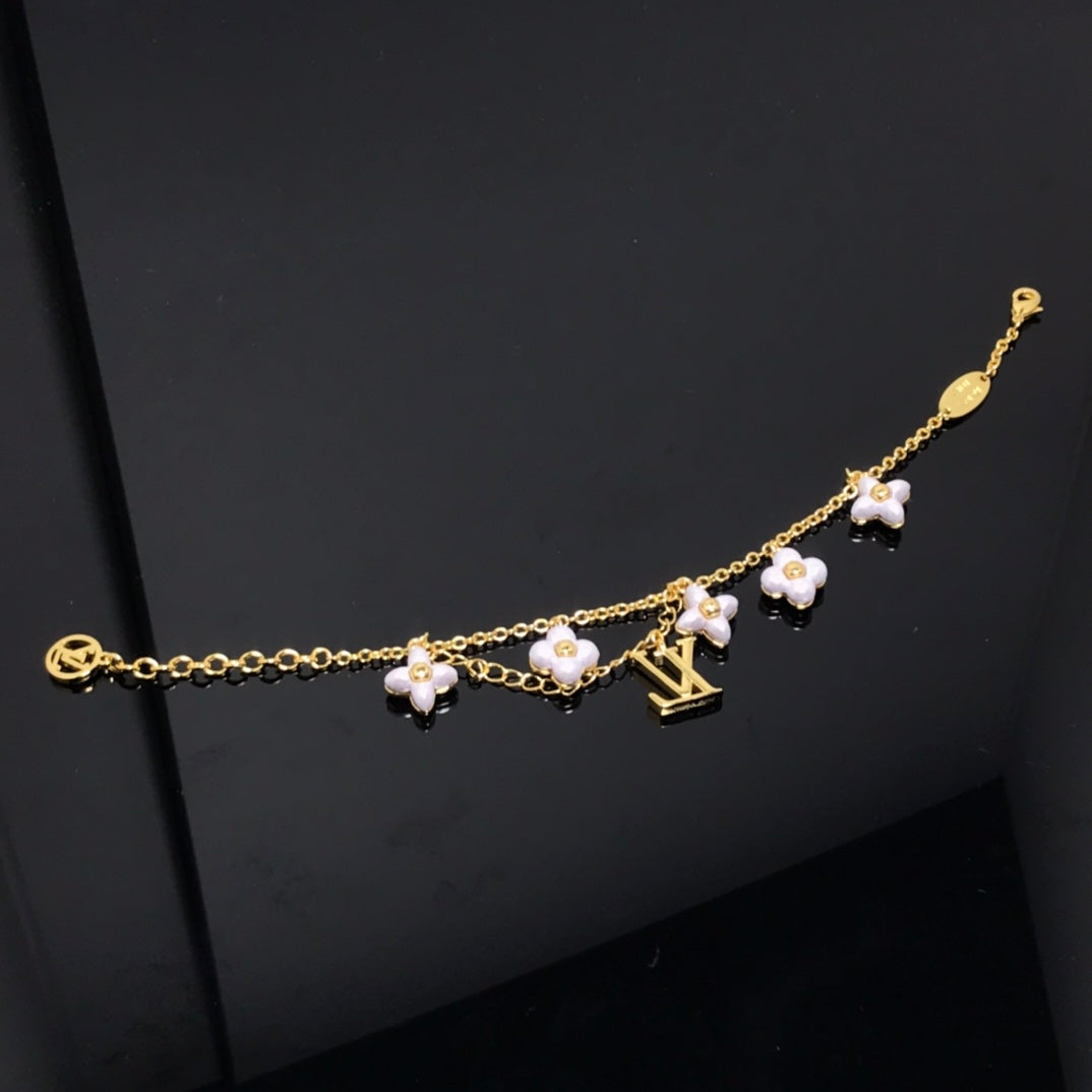 ??MIRA?¡¥LOGO 6 MOTIF STAR AND SUN GOLD BRACELET